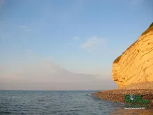 Computer screen wallpaper: Early morning sunlight on the cliffs.