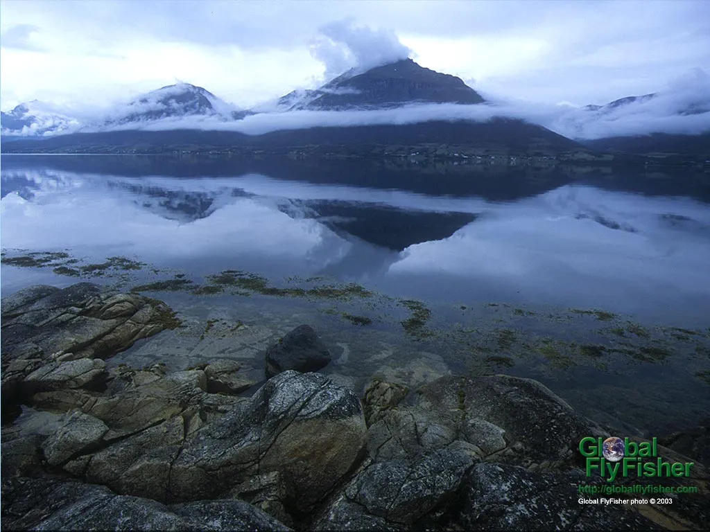 Computer screen wallpaper: A calm Norwegian fjord.
